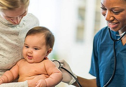mother and baby with pediatrician